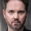 Damian Gallagher as Matthew Robbins (uncredited)