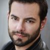 Jamie Elman as Aaron Bluth