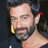 Yehuda Levi as Izek