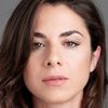 Claudia Ferranti as Recepcionist