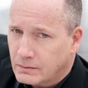 Guy Van Swearingen as Eddie the Priest