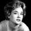 Sylvia Syms as Cashier (as Sylvia Simms)