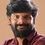 'Ganja' Karuppu as Muthu
