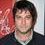 Adam Busch as Geeky Guy