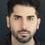 Neftali Hernandez as Bank Teller #1