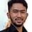 Alfie Alfandi as Ustadz Zaini