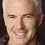 John Burke as TV News Reporter