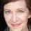 Laura A. Fisher as Newscaster