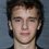 Maciej Musial as Boy on Coach