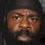 Kimbo as Gravedigger