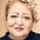 Lili Farhadpour as Mina's neighbour