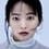 Woo-hee Chun as The Mysterious Woman