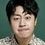 Bae Yoo-ram as High school student 1 with helium balloon