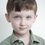 Henry Kelemen as Apple-Cheeked Boy