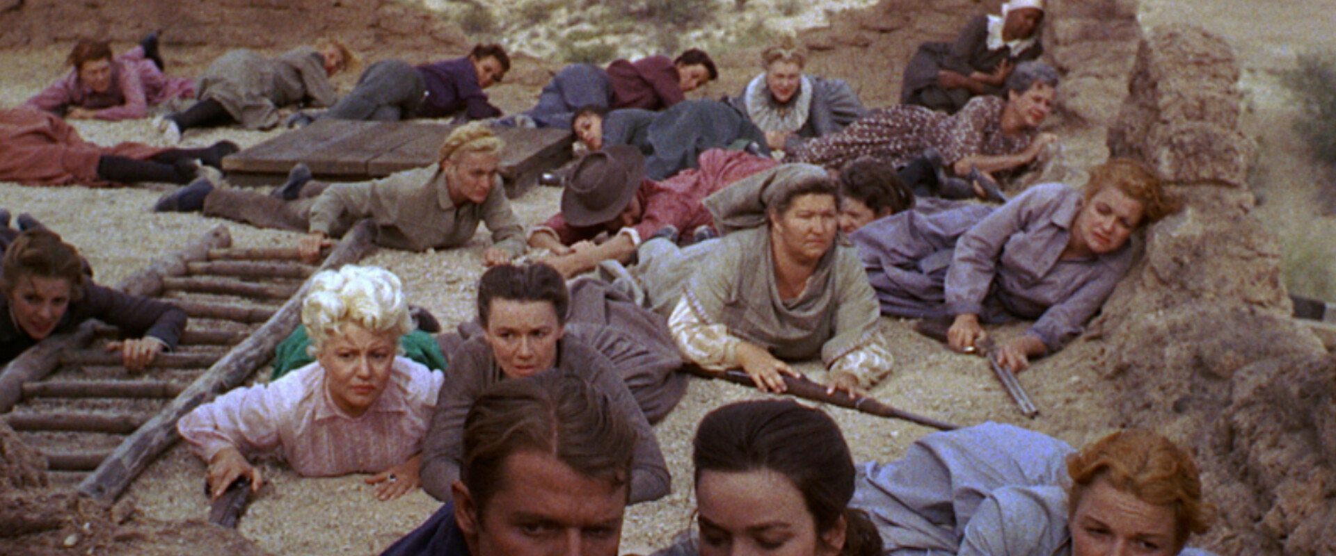 The Guns of Fort Petticoat background