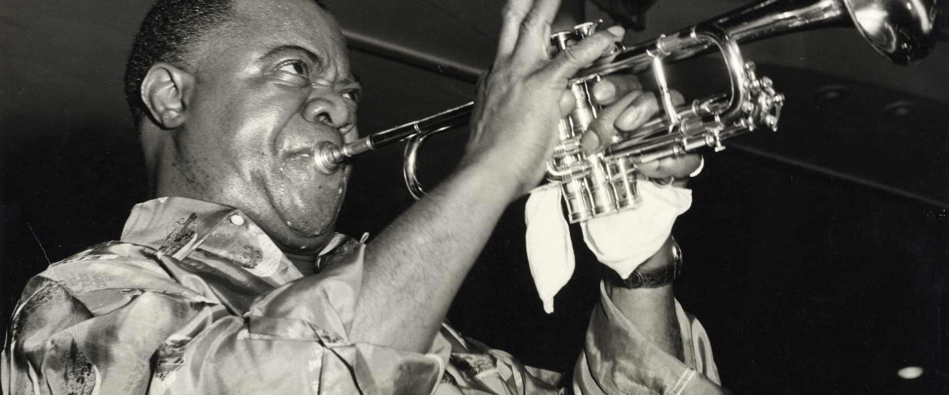 Louis Armstrong's Black & Blues background