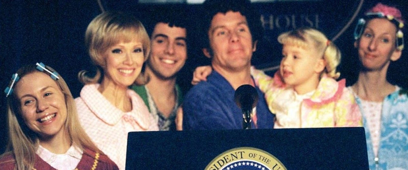 The Brady Bunch in the White House background
