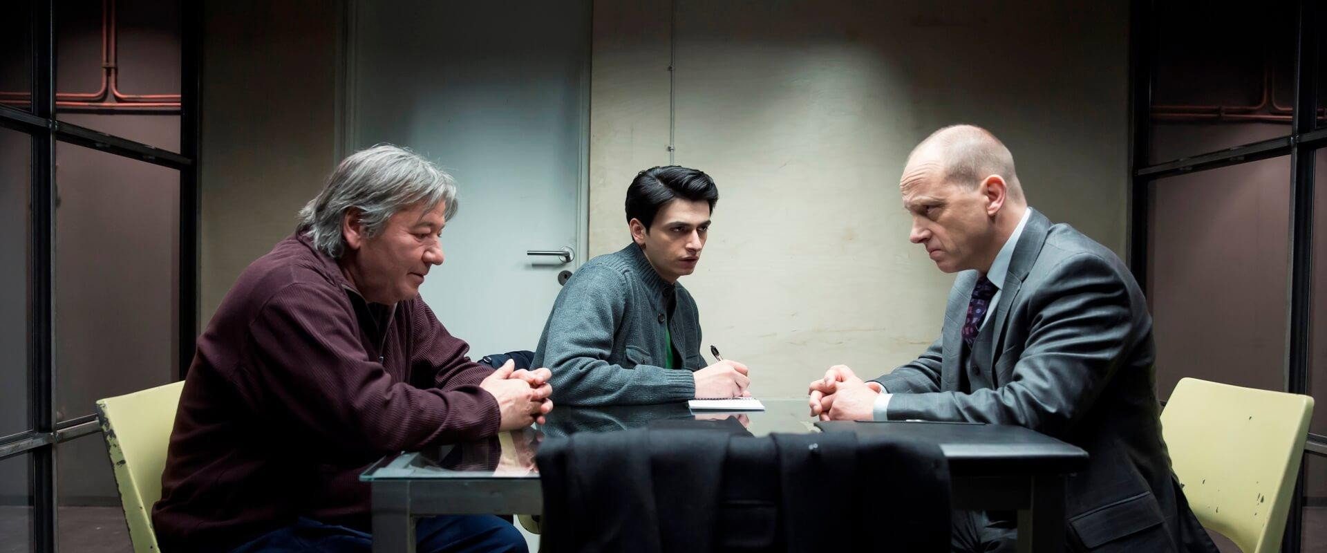 The Prosecutor, the Defender, the Father and his Son background