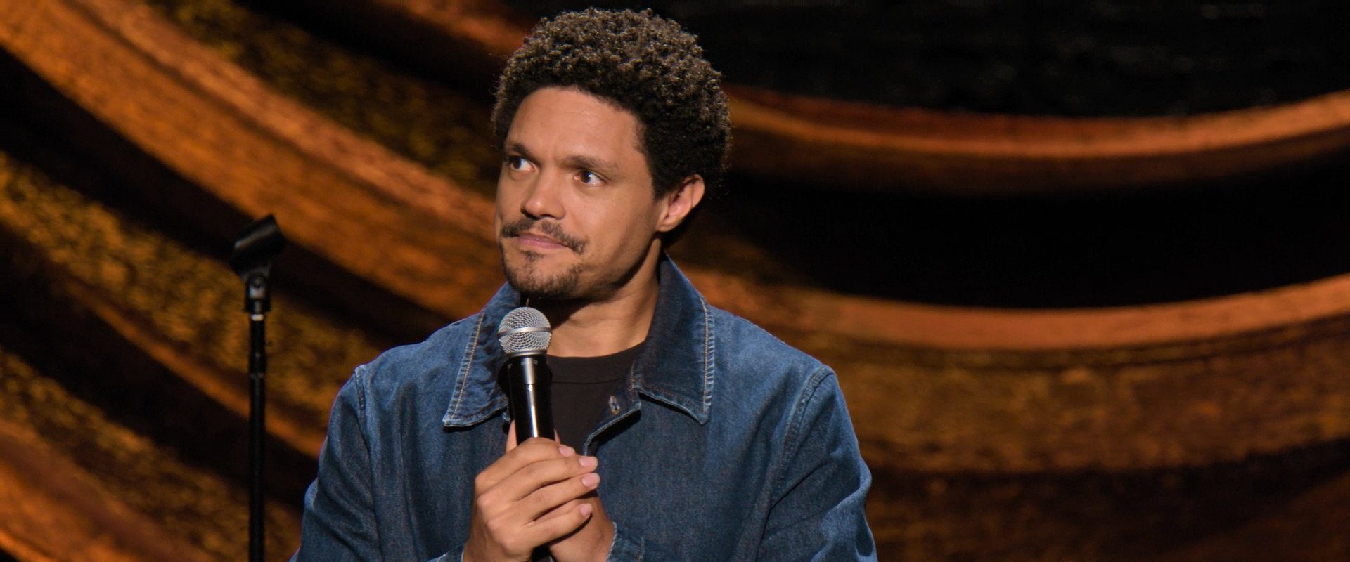 Trevor Noah: Joy in the Trenches background