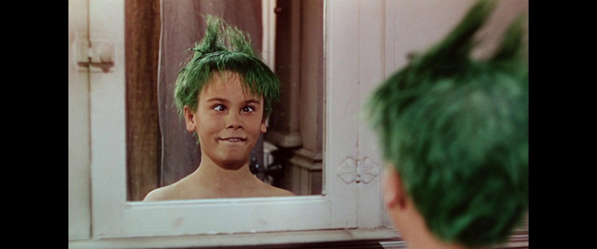 The Boy with Green Hair background