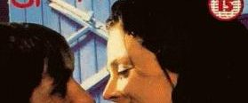 One Woman or Two background