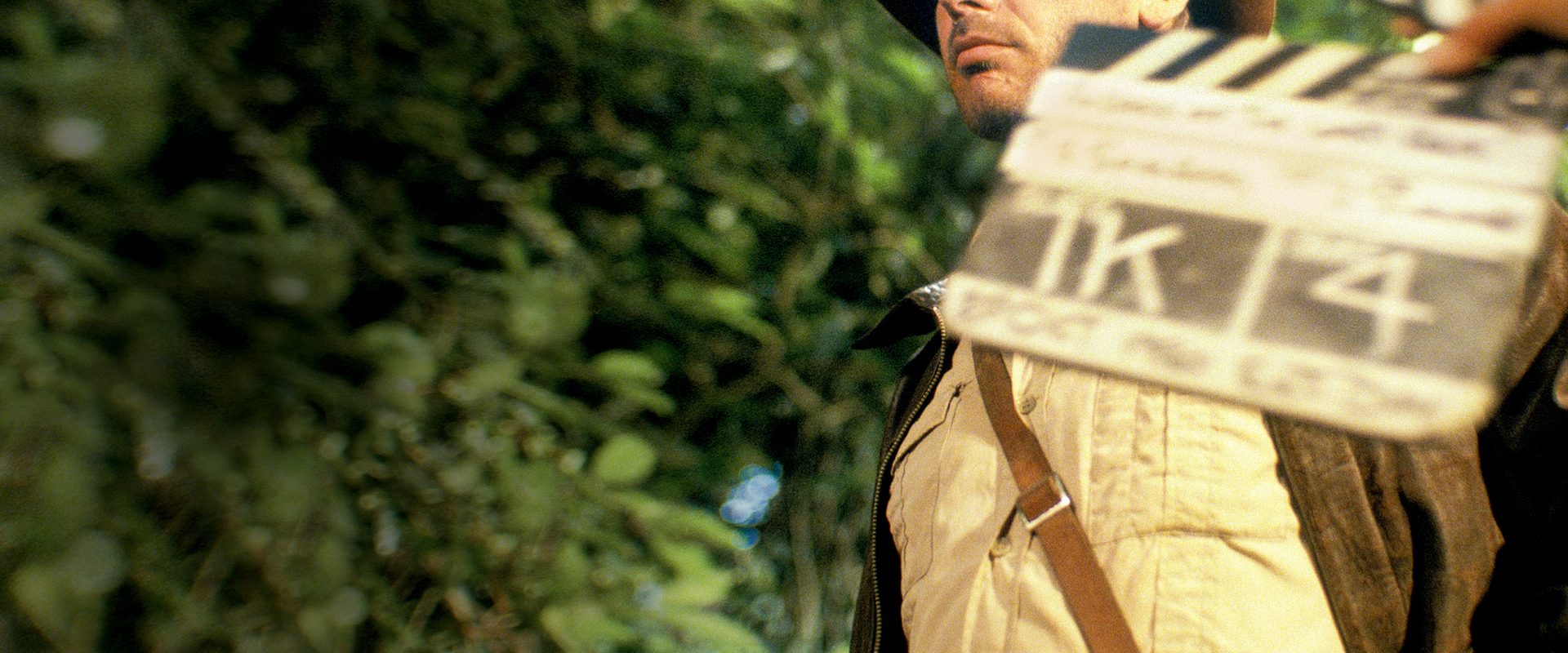 Timeless Heroes: Indiana Jones and Harrison Ford background