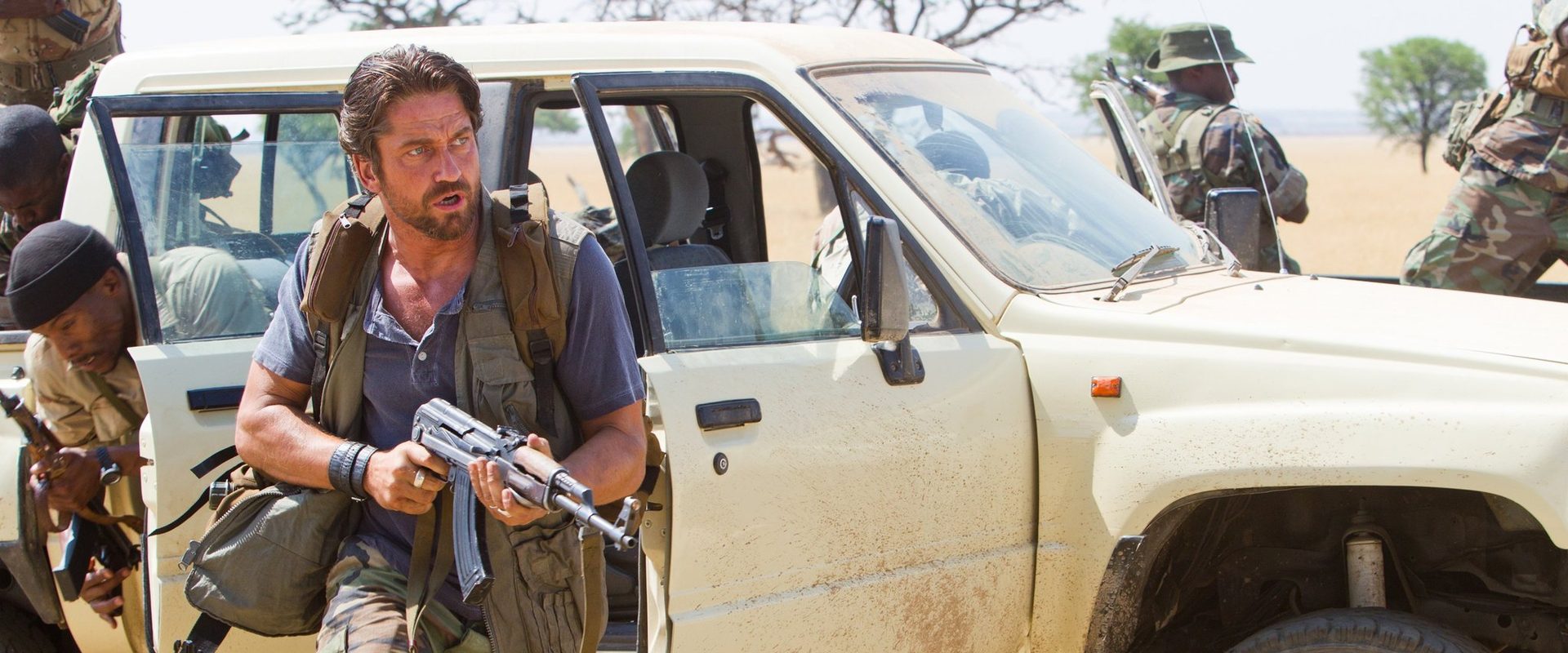 Machine Gun Preacher background
