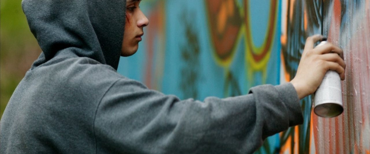 The Graffiti Artist background