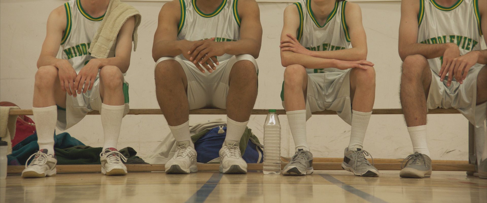 Events Transpiring Before, During, and After a High School Basketball Game background