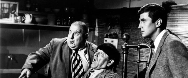 The Three Stooges Go Around the World in a Daze background