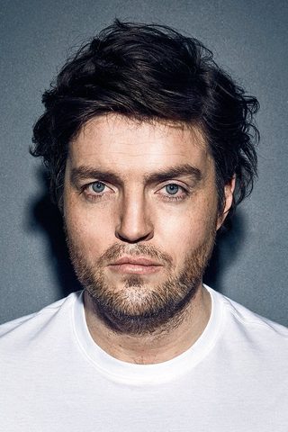 Tom Burke, photo 1 of 3
