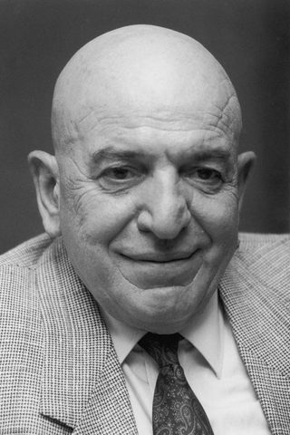 Telly Savalas, photo 1 of 3