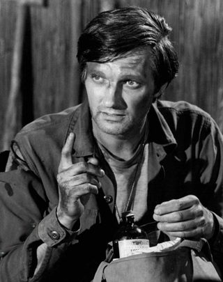 Alan Alda, photo 1 of 3