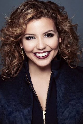Justina Machado, photo 1 of 3