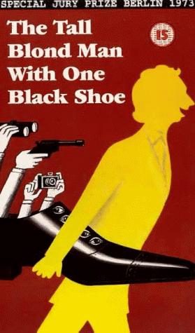The Tall Blond Man with One Black Shoe still 5