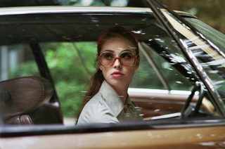 The Lady in the Car with Glasses and a Gun still 7
